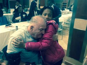 child hugging veteran 